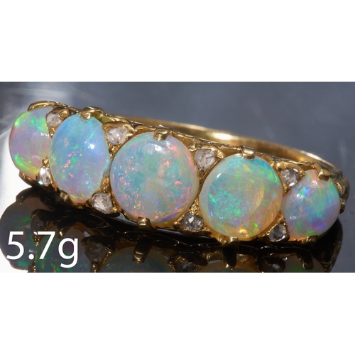 189 - ANTIQUE OPAL AND DIAMOND 5-STONE RING,
High carat gold.
Opals with good play of colour, including re... 