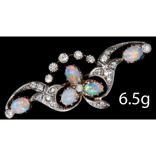 198 - VICTORIAN OPAL AND DIAMOND SET BROOCH. 
Gold and silver
opals are vibrant with great play of colour,... 