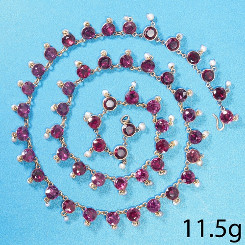 186 - FINE GEORGIAN GARNET AND PEARL NECKLACE. 
High carat gold.
Vibrant garnets, each suspending a pearl ... 