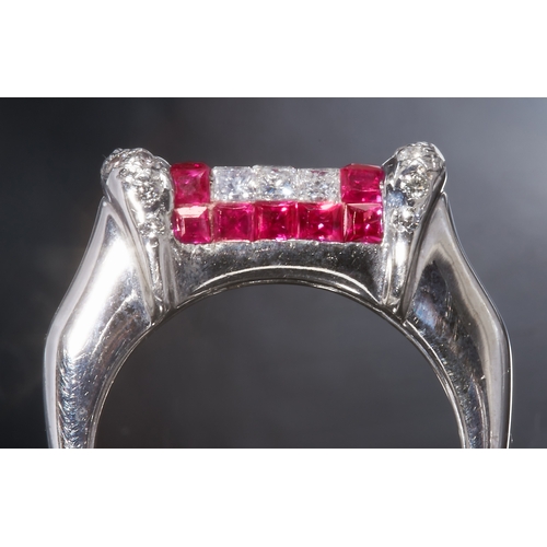 85 - RUBY AND DIAMOND PART INVISIBLE SET  RING
18 ct. gold.
Vibrant rubies totalling approx. 1 ct.
Diamon... 