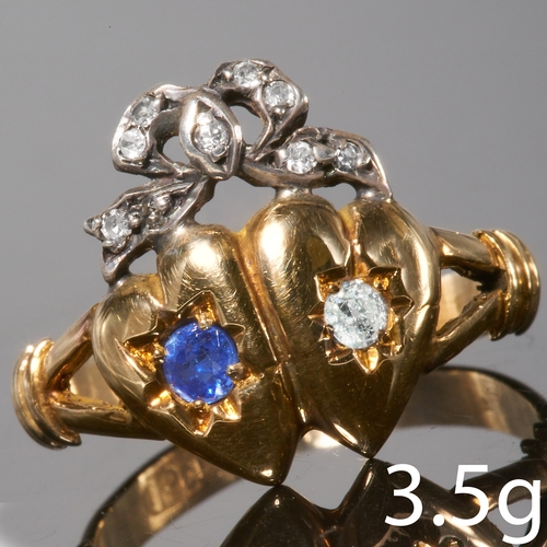 126 - ANTIQUE SAPPHIRE AND DIAMOND DOUBLE HEART RING, 
in 15 ct. gold. 
One heart set with a blue sapphire... 