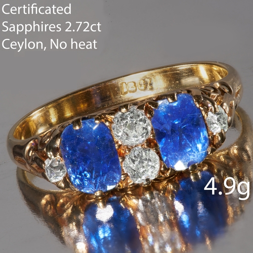 2 - CEYLON SAPPHIRE AND DIAMOND RING, 
in 18 ct. gold. 
2 vibrant blue Ceylon sapphires totalling approx... 