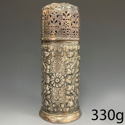 25 - FINE ANTIQUE SILVER SUGAR CASTER, London 1888.
Fine embossed floral decoration.
Woodward & Co, Londo... 