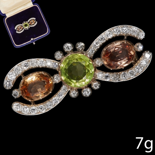 3 - ANTIQUE VICTORIAN PERIDOT TOPAZ AND DIAMOND BROOCH
Strong vibrant peridot (8.2 mm. diam.)
Orange top... 