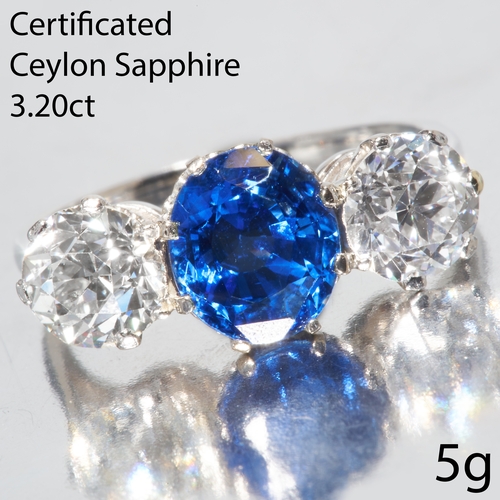 48 - CERTIFICATED CEYLON SAPPHIRE AND DIAMOND 3-STONE RING
in high carat gold.
Vibrant and rich blue sapp... 