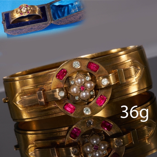 5 - FINE VICTORIAN RUBY, PEARL AND DIAMOND HINGED BANGLE. 
High carat gold.
Vibrant rubies, well matched... 