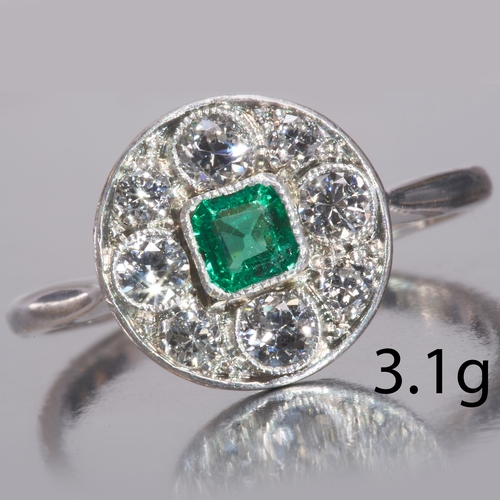 6 - EMERALD AND DIAMOND CLUSTER RING,
18 ct. gold and platinum.
Rich and vibrant emerald.
Diamonds brigh... 