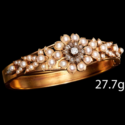 9 - IMPRESSIVE ANTIQUE VICTORIAN PEARL AND DIAMOND SET HINGED BANGLE. 
High carat gold.
Pearls well matc... 