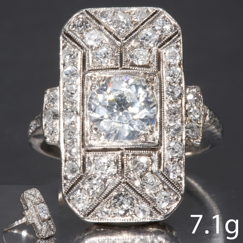 18 - LARGE ART-DECO DIAMOND RING,
platinum.
Diamonds totalling approx. 2.10 ct.
Center diamond 1.10 ct.
B... 