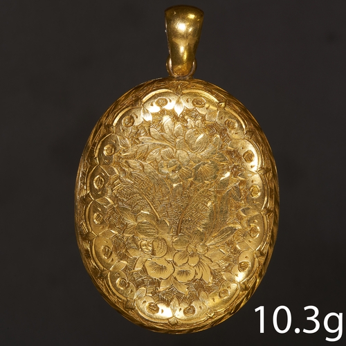 29 - VICTORIAN OVAL LOCKET PENDANT.
High carat gold.
L. 4.5 cm.
10.3 grams.