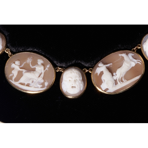 114 - RARE AND UNUSUAL ANTIQUE CAMEO NECKLACE,
High carat gold.
The larger carved cameo's depicting a pers... 