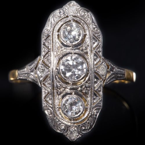 127 - ART-DECO DIAMOND RING, 
High carat gold
Set to the center with 3 larger bright and lively diamonds.
... 