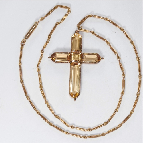 139 - CERTIFICATED IMPERIAL TOPAZ CROSS PENDANT AND A CHAIN.
High carat gold.
Set with vibrant rich topaz ... 