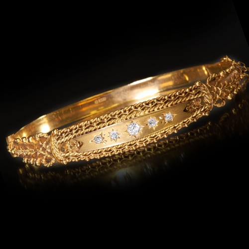 162 - ANTIQUE GOLD DIAMOND HINGED BANGLE,
Diamonds bright and lively.
Inner diam. 6.1 cm.
10 grams.