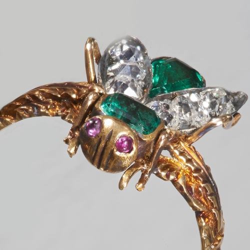 173 - RARE ANTIQUE EMERALD AND DIAMOND FLY RING,
High carat gold.
Vibrant emeralds.
Bright and lively diam... 
