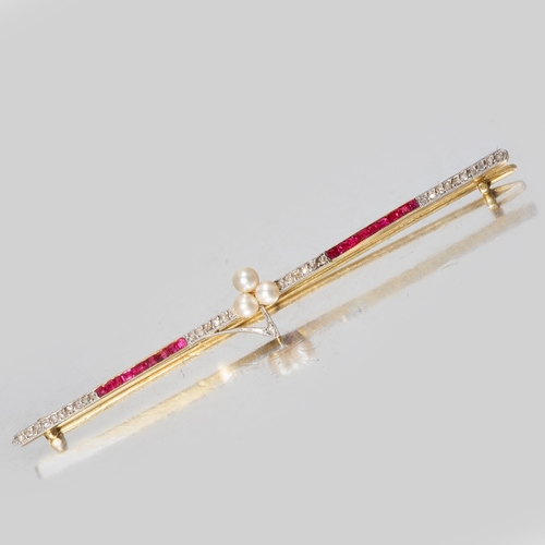 203 - EDWARDIAN RUBY PEARL AND DIAMOND BAR BROOCH, 
18 ct. gold. 
The bar set with vibrant rubies and live... 