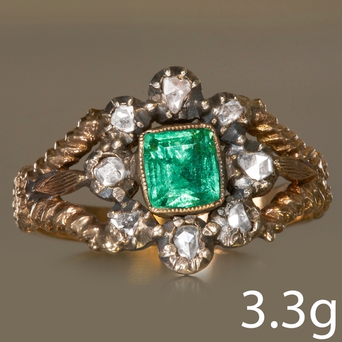 70 - ANTIQUE EMERALD AND DIAMOND CLUSTER RING,
High carat gold.
Vibrant foiled back emerald of approx. 0.... 