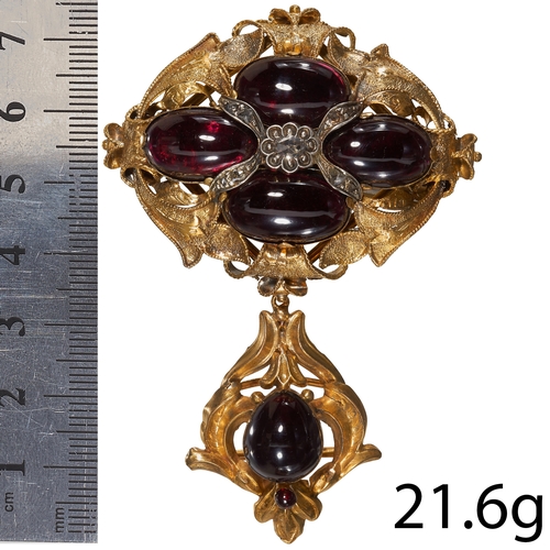 84 - VICTORIAN GARNET AND ROSE CUT DIAMOND BROOCH
High carat gold.
Garnets well matched
L: 7.5 cm.
21.6 g... 