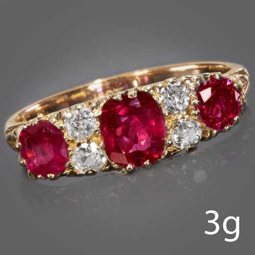 103 - ANTIQUE RUBY AND DIAMOND SEVEN STONE RING.
18 ct gold.
Set with vibrant rich colour rubies.
Bright a... 