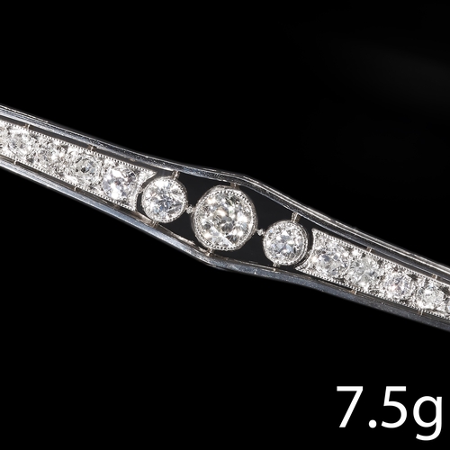108 - EDWARDIAN DIAMOND BAR BROOCH.
Set with bright and lively diamonds totalling approx.: 1 ct.
Width: 8.... 