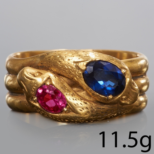 111 - FINE RUBY AND SAPPHIRE DOUBLE SNAKE RING,
High carat gold.
Gemstones totalling approx. 1.45 ct.
Vibr... 