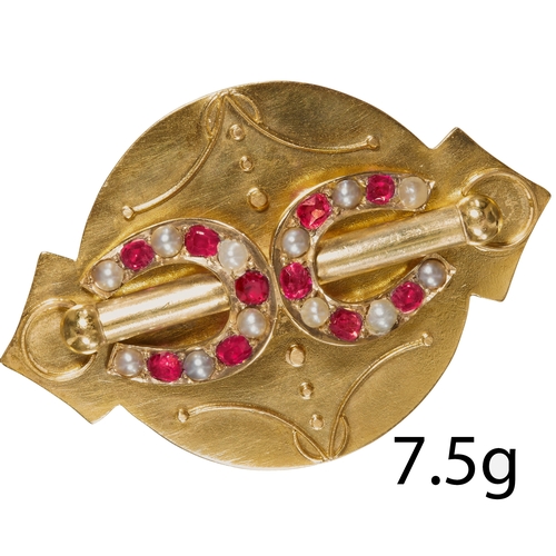 118 - ANTIQUE VICTORIAN RUBY AND PEARL DOUBLE HORSE SHOE BROOCH
High carat gold. 
The horseshoes set with ... 