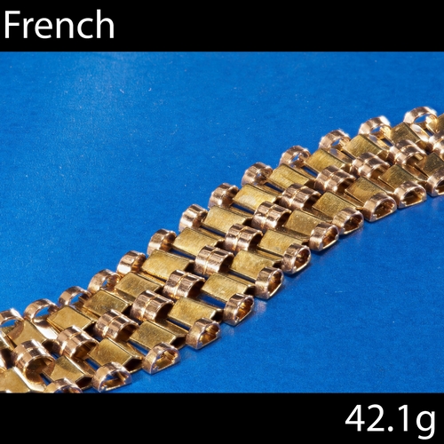 128 - FINE FRENCH LINK BRACELET,
18 ct. gold. Red and yellow gold.
The links of rounded and triangular des... 