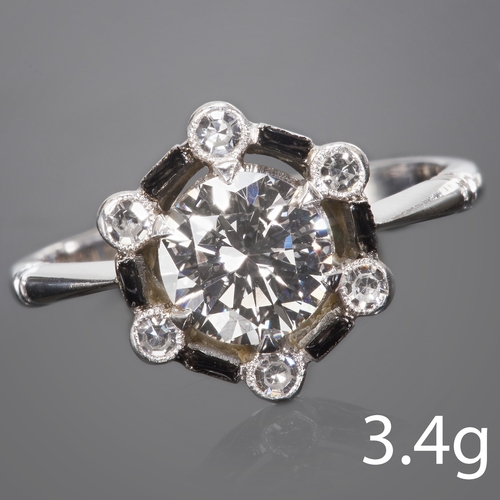 134 - ART DECO DIAMOND AND ENAMEL CLUSTER RING
18 ct gold and platinum
Diamond bright and lively approx 1.... 