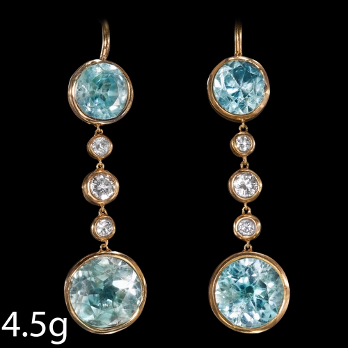 135 - PAIR OF ZIRCON AND DIAMOND DROP EARRINGS,
High carat gold.
Vibrant blue zircons.
Diamonds bright and... 