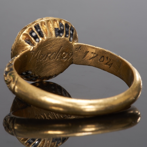 153 - HIGHLY UNUSUAL, RARE AND MAGNIFICENT 1702 STUART SKELETON RING,
High carat gold.
The head depicting ... 