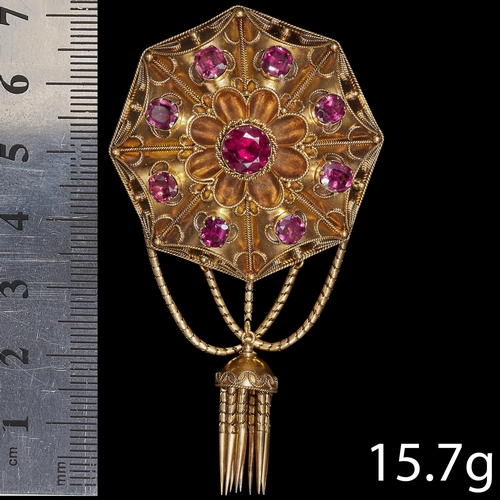 156 - VICTORIAN GARNET TASSEL BROOCH. 
High carat gold.
Vibrant well matched garnets.
Locket back.
L. 7.1 ... 