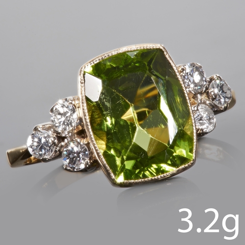 171 - PERIDOT AND DIAMOND RING.
18ct gold.
Set with a vibrant peridot.
Bright and lively diamonds.
Total g... 