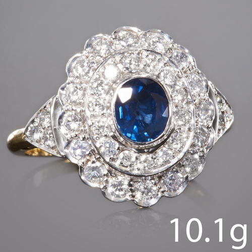 73 - SAPPHIRE AND DIAMOND CLUSTER RING, 
in 18 ct. gold. 
Vibrant blue sapphire of approx. 0.61 ct.
Diamo... 