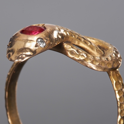 82 - RUBY SNAKE RING.
High carat gold.
Set with vibrant ruby,
Size: O
3.9 gram