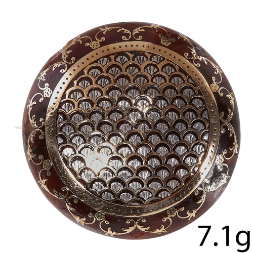 83 - VICTORIAN TORTOISE AND GOLD INLAID BROOCH. 
of circular design. 
3.6 cm diam.
7.1 grams
