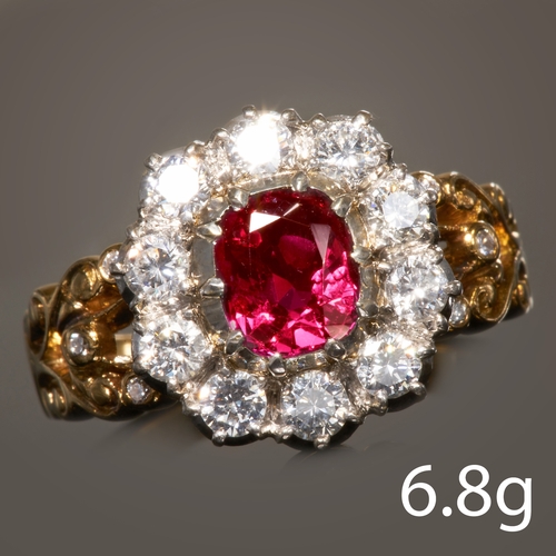 91 - RUBY AND DIAMOND CLUSTER RING, 
High carat gold.
Gemstones totalling approx. 1.64 ct.
Rich and vibra... 