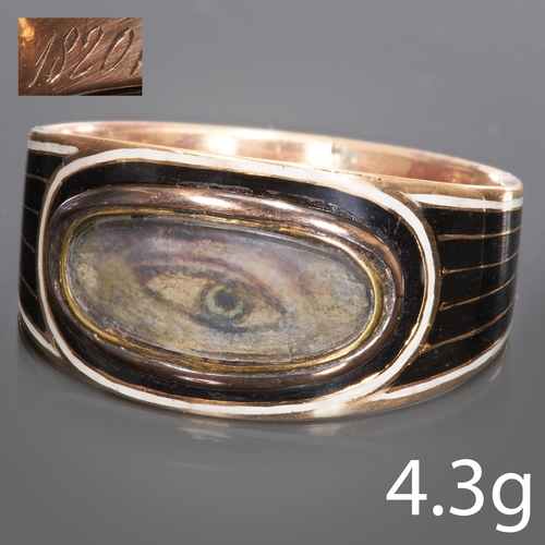 93 - FINE GEORGIAN LOVERS EYE GOLD AND ENAMEL RING. 
High carat gold.
dated 1820.
Fine lovers eye.
Black ... 