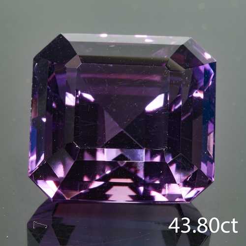 140 - LARGE VIBRANT LOOSE CUT AMETHYST,
Approx 43.80 ct.
21.2 x 19.9 x 15.7 mm.