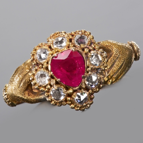 144 - ANTIQUE RUBY AND DIAMOND HAND CLUSTER RING,
15 ct. gold.
Vibrant ruby.
Bright and lively diamonds.
T... 