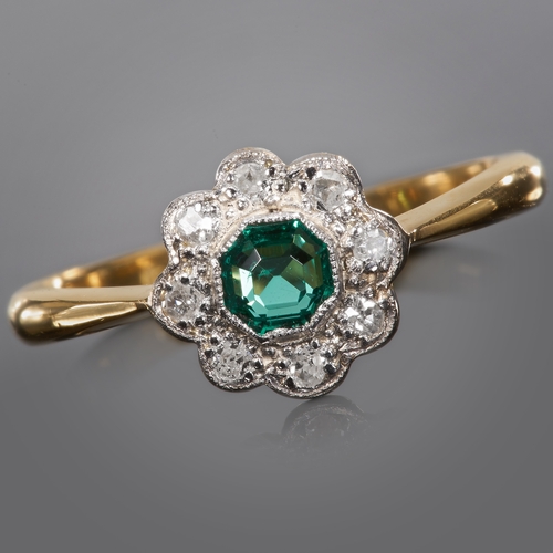167 - EMERALD AND DIAMOND CLUSTER RING.
18ct gold.
Set with vibrant rich colour emerald.
Bright and lively... 