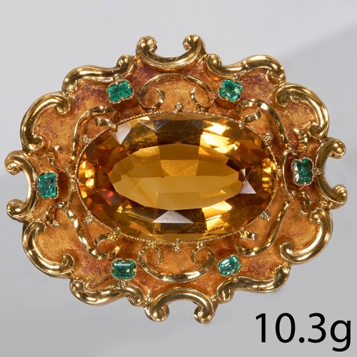 88 - ANTIQUE CITRINE AND EMERALD BROOCH,
High carat gold.
Large vibrant citrine of approx. 21.5 x 14.3 x ... 