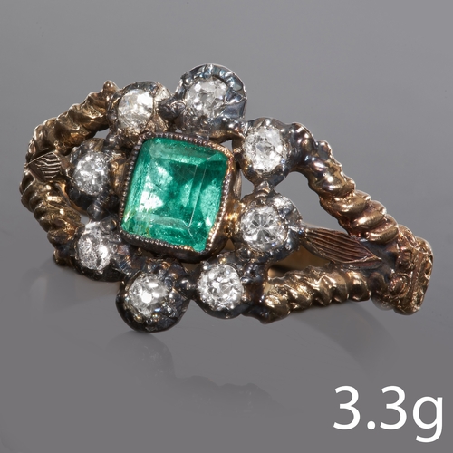 161 - ANTIQUE EMERALD AND DIAMOND CLUSTER RING,
High carat gold.
Vibrant foiled back emerald of approx. 0.... 