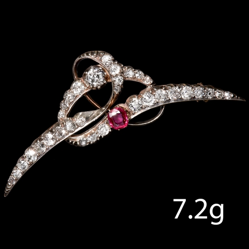 124 - ANTIQUE RUBY AND DIAMOND CRESCENT BROOCH. 
High carat gold and silver.
Rich and vibrant ruby.
Diamon... 