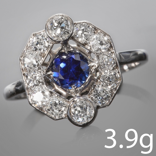 129 - ART-DECO SAPPHIRE AND DIAMOND CLUSTER RING,
3.9 grams, testing 18 ct. gold.
Vibrant blue sapphire.
D... 