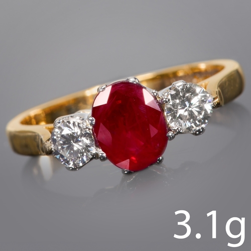 157 - RUBY AND DIAMOND 3-STONE GOLD RING,
Gemstones totalling approx. 1.60 ct.
Vibrant ruby of approx. 1.1... 