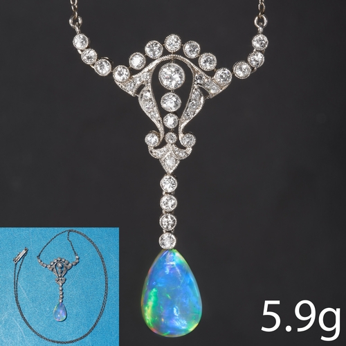 181 - OPAL AND DIAMOND PENDANT NECKLACE.
Set with an opal of good play of colour.
Bright and lively diamon... 