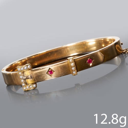 186 - VICTORIAN RUBY AND PEARL GOLD HINGED BANGLE,
Inner diam. 5.7 cm.
12.8 grams.
no dents.