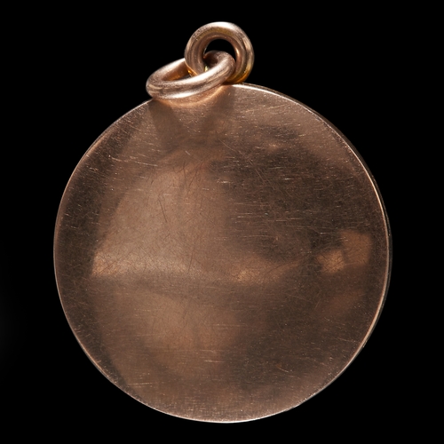 196 - AN UNUSUAL DOUBLE PHOTO LOCKET. 
with revolving center.
2.9 cm diameter. 
11.8 grams.