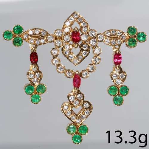 240 - EMERALD, RUBIES AND DIAMOND BROOCH.
13.3 gram, 18 ct. gold.
Set with bright and lively diamonds tota... 