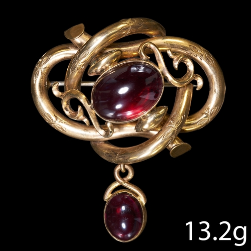 242 - VICTORIAN GARNET BROOCH.
13.2 grams. Testing 14/15 ct. gold. 
with vibrant garnets
locket back 
L: 4... 